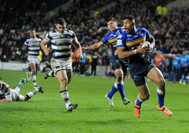 Leeds Rhinos' Kallum Watkins trygoes over for a second-half try. Picture: Steve Riding.