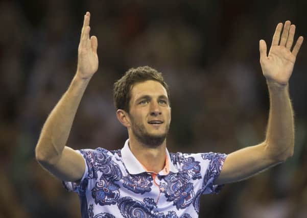 Great Britain's James Ward celebrates defeating USA's John Isner during the Davis Cup match at the Emirates Arena, Glasgow.