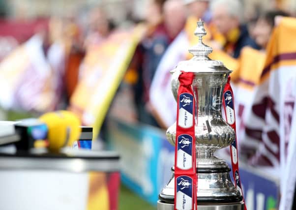 The FA Cup on it's plinth before the game during the FA Cup Sixth Round match at Valley Parade, Bradford.