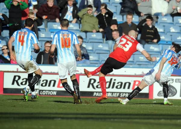 Rotherham United's Conor Sammon scores the Millers' second goal.