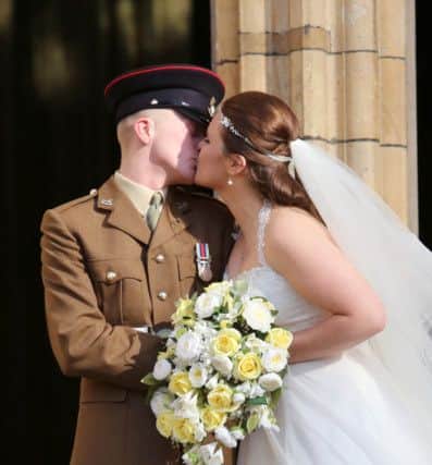Picture:  Lorne Campbell  / Guzelian
The wedding of Rosie-Ann Stone (22) and Private Liam Fisher (22) at York Minster, York, North Yorkshire, on Saturday. Private Fisher tried to save the life of Private Gregg Stone (22), brother of the bride, who was fatally injured in Afghanistan. Picture shows them leaving the Minster.
WORDS BY MARK BRANAGAN
PICTURE TAKEN ON SATURDAY 7 MARCH 2015