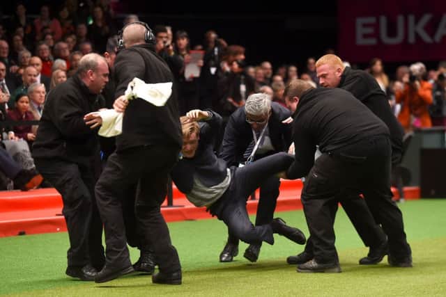 Protestor Luke Steele, a 25 year-old Leeds law student, was removed by security after entering the ring following the announcement of Best in Show during day four of Crufts 2015 at the NEC in Birmingham.
