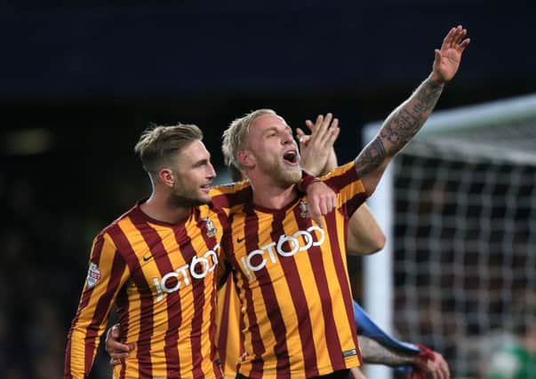 Bradford City's Gary Liddle (left) and Andrew Davies (right) celebrate after the FA Cup Fourth Round match at Stamford Bridge