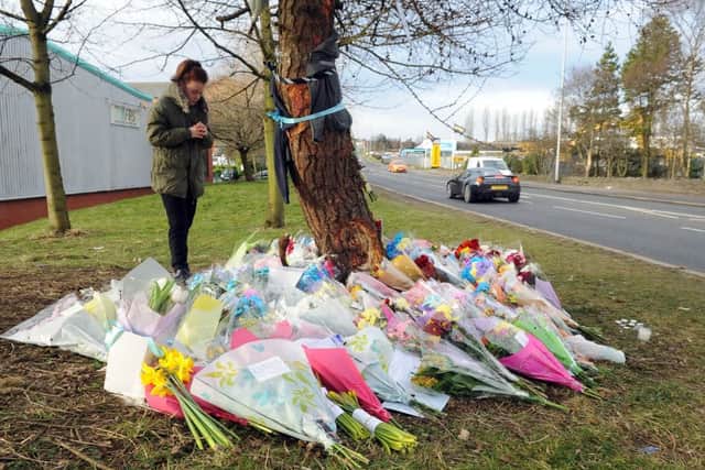 Floral tributes and messages at the scene on Gelderd Road, Morley, Leeds