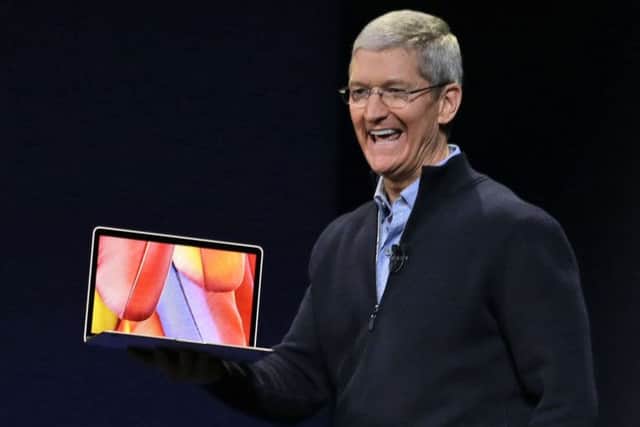 CEO Tim Cook introduces the new Apple Watch and MacBook during an Apple event on Monday evening