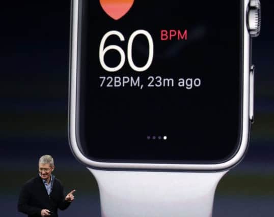 Apple CEO Tim Cook explains the features of the new Apple Watch