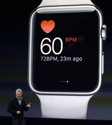 Apple CEO Tim Cook explains the features of the new Apple Watch