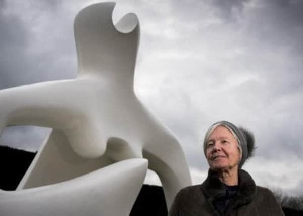 Mary Moore with Large Reclining Figure, 1984. Reproduced by permission of The Henry Moore Foundation. Picture: Jonty Wilde