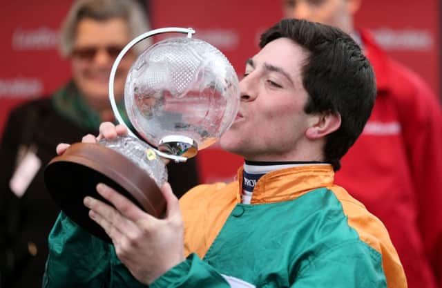 WINNER: Jockey Gavin Sheehan celebrates winning the Ladbrokes World Hurdle with Cole Harden at Cheltenham Festival.