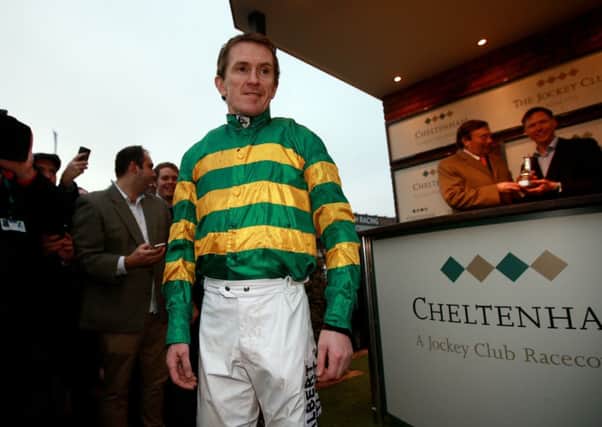 END GAME: Tony McCoy acknowledges the crowd after his last race during the Cheltenham Festival on Gold Cup day. Picture: David Davies/PA.