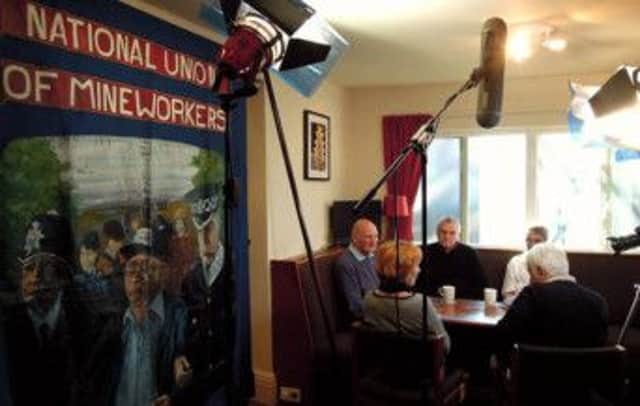Filming for the documentary With Banners Held High.
