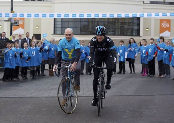 Ben Swift (R) and former cyclist Brian Robinson (L) pictured with local school children to launch the route of the 2015 Tour de Yorkshire.