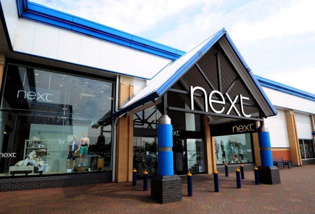 Next said it is remaining "very cautious" despite building its advantage over rival Marks & Spencer