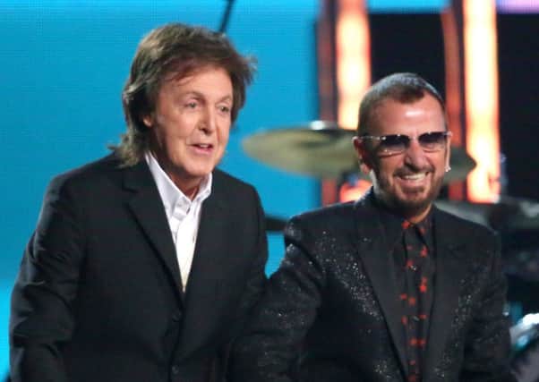 Paul McCartney and Ringo Starr appear at the 56th annual Grammy Awards in Los Angeles