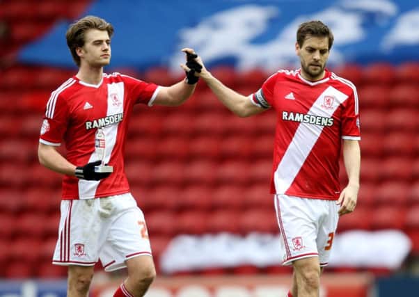 Middlesbrough's Jonathan Woodgate, right, celebrates with Patrick Bamford after last Saturday's win over Ipswich  (Picture: Richard Sellers/PA Wire).