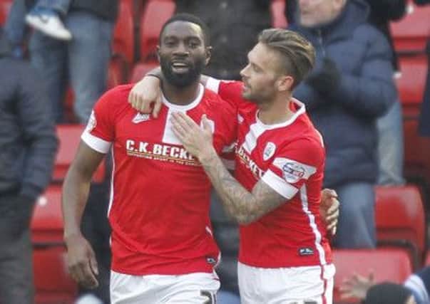 Barnsley substitute striker Jabo Ibehre is congatulated by James Bailey after equalising against Preston North End  (Picture: Mick Walker/CameraSport).