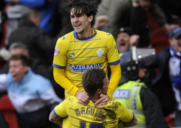 Kieran Lee is hoisted in the air after his stoppage-time winning goal for Sheffield Wednesday against Rotherham United (Picture: Steve Ellis).