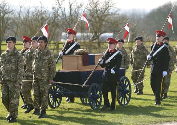The coffin carrying the remains of Richard III leave after a service at Bosworth Battlefield in Nuneaton, Warwickshire.