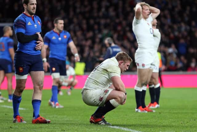 England's players show their dejection after missing out on the Six Nations title again. Picture: David Davies/P.