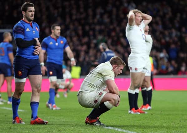 England's players show their dejection after missing out on the Six Nations title again. Picture: David Davies/P.