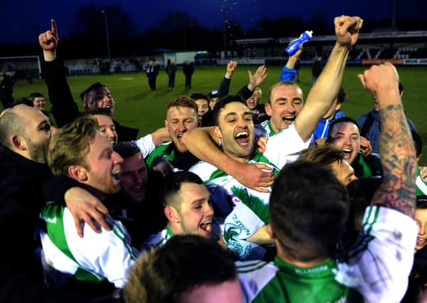 North Ferriby United players celebrate their FA Trophy semi-final win over Bath City last month, which secured their place at Wembley (Picture: Jonathan Gawthorpe).