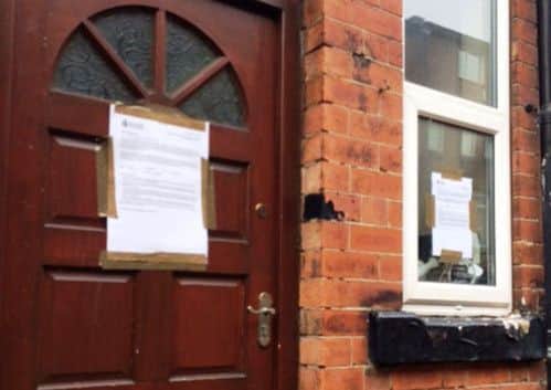 The venue in Headingley with a 'cancelled' notice on the door