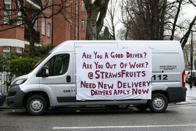 A van with a banner outside Jeremy Clarkson's home in Kensington, west London