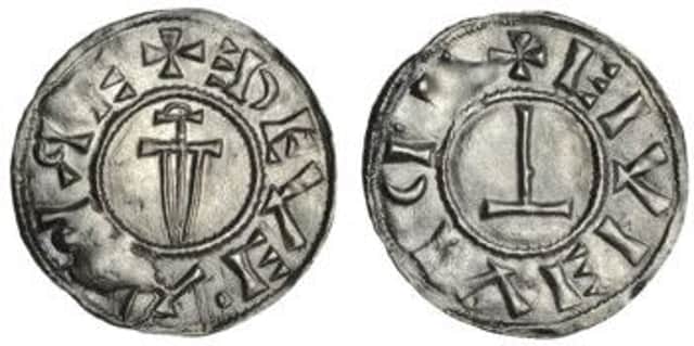 A Viking coin showing both the Christian cross and Thors hammer which fetched £8,400 today.