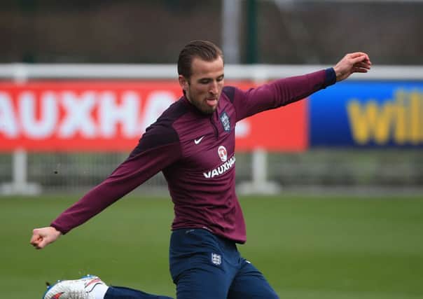 Harry Kane, who could make his debut for England tonight against Lithuania or on Tuesday against Italy, pictured yesterday during a training session in Enfield (Picture: Nick Potts/PA Wire).
