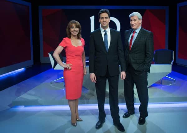 Labour leader Ed Miliband with Kay Burley (let) and Jeremy Paxman (right)