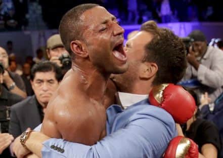 Kell Brook, left, celebrates his win against Shawn Porter  in Carson, Calif. (AP Photo/Chris Carlson)
