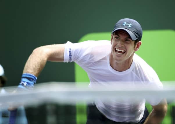 Andy Murray serves on his way tpo victory over the USA's Donald Young in the Miami Open. AP/J Pat Carter/AP.