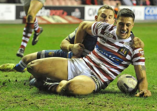 Wigan Warriors' Anthony Gelling  scores his hat trick try against Wakefield.