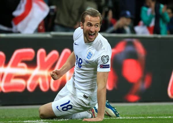 Harry Kane celebrates scoring England's fourth goal against Lithuania..