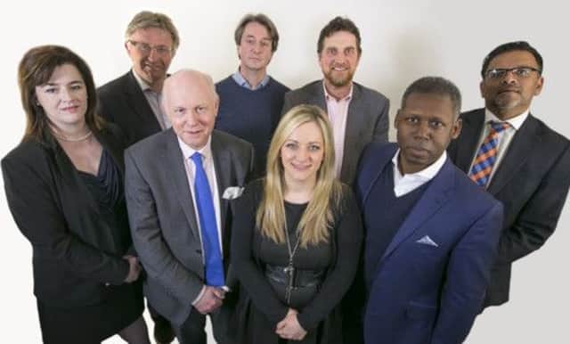 The new Leeds office of Excello Law. Front row left to right: Helen Seedat, David Bowden, Anna Shaw, George Bisnought Back row left to right: Andrew Hoyle, Philip OLoughlin, Peter Rawlinson, Steve Thomas