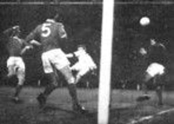 Billy Bremner scores for Leeds United's winning goal in the 1965 FA Cup semi-final replay.