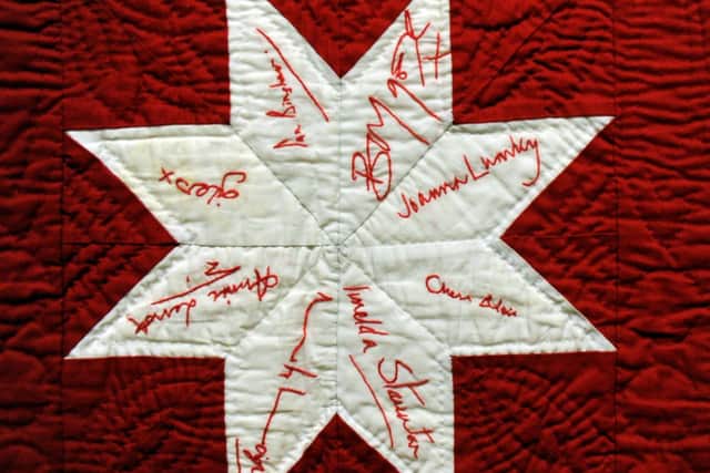Part of a signature quilt made by prisoners at HMP Bullingdon, part of an exhibition 'Voices From The Inside' at the  Quilt Museum in York