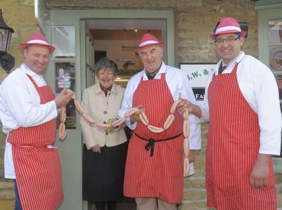Picture by Tony Bartholomew.  From left...James Glaves, Christine Noble, Brian Glaves and Anthony Glaves as they perform a sausage cutting ceremony to officially open the new Glaves' Butchers shop in Brompton-By -Sawdon near Scarborough.  Christine's father was the previous owner of the well known butchers before Brian Glaves bought the business from him in 1972.