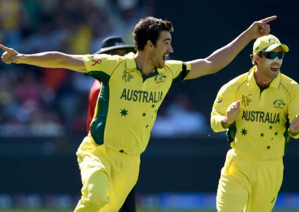 Australia's Mitchell Starc, left,is one of a number of bowling options in a strong attack.