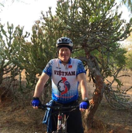 My Passion: Tony Passmore pedalling around the world for charity.