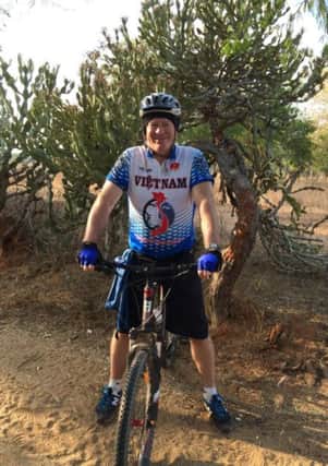 My Passion: Tony Passmore pedalling around the world for charity.