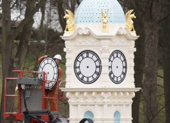 The restored Oakwood Clock is put back in position Picture: Scarlett Carson