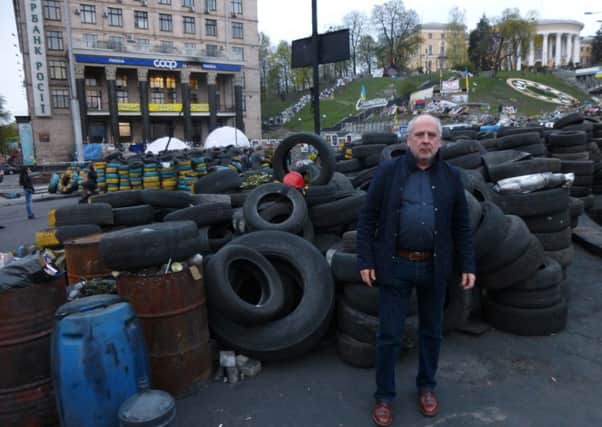 Coun Mick Burchill in Ukraine, following last February's revolution.