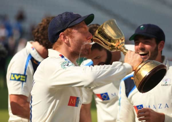Yorkshire's Jonny Bairstow celebrates by drinking Champagne out of the trophy after winning the Division One County Championship on day four of the LV= County Championship Division One match at Trent Bridge, Nottingham. SSOCIATION Photo. Picture date: Friday September 12, 2014. See PA story CRICKET Nottinghamshire. Photo credit should read: Mike Egerton/PA Wire