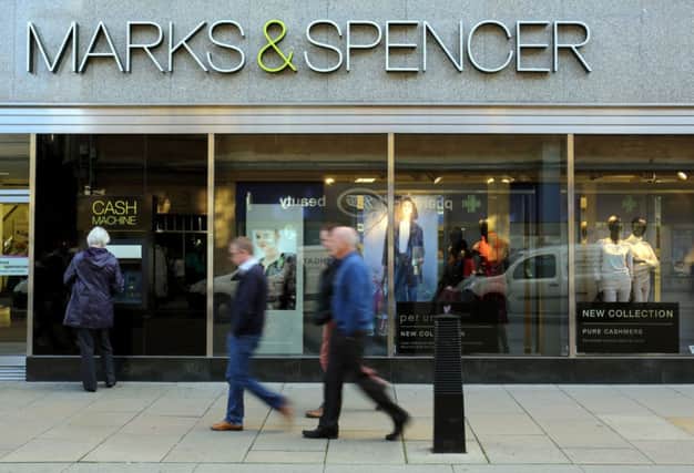 Marks & Spencer registered a surprise improvement in sales at its clothing division - the first rise in more than three years of trading.