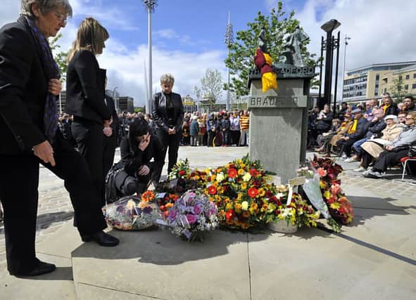 Relatives of those who died at the Bradford City Fire Disaster lay wreaths at a Memorial in Centenary Square, Bradford, at the 29th Anniversary Commemoration.