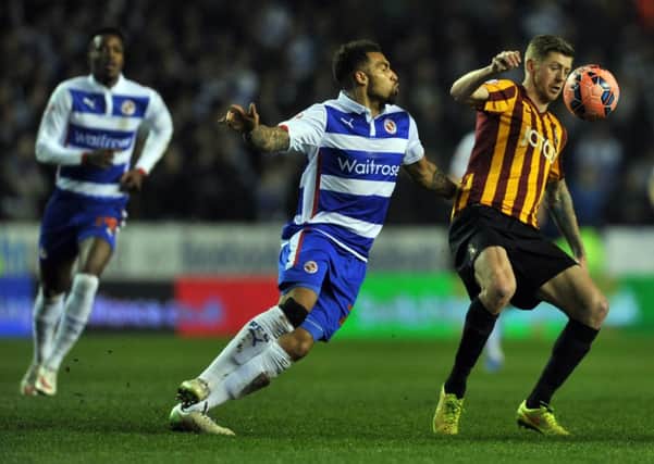 Jon Stead shields the ball from Readings Danny Williams during Bradford Citys FA Cup adventure (Picture: James Hardisty).