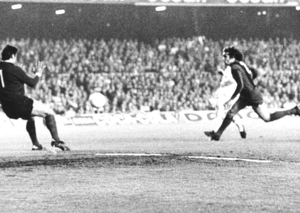9th April 1975 - 

Leeds United v Barcelona.

 Lorimer hits the ball into the net for a United goal.