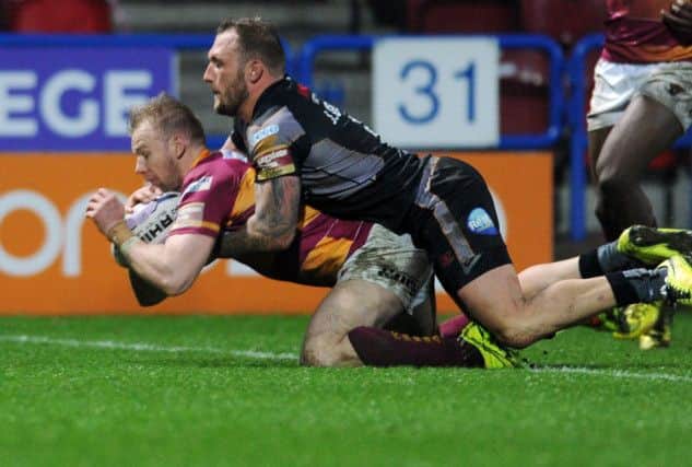 Huddersfield Giants' Aaron Murphy goes over the line. Picture: Steve Riding.