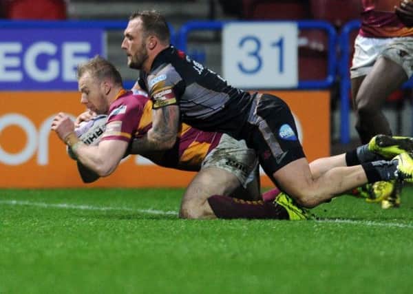 Huddersfield Giants' Aaron Murphy goes over the line. Picture: Steve Riding.